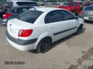 ✅ 2009 Kia Rio LX • VIN: KNADE223696518773 • Лот: 42692771. Опубликован ранее на IAAI с пробегом 156 430 миль. Бесплатный доступ к архиву аукционных продаж из США и подробный отчёт об истории автомобиля на DreamBid. Изображение 4.