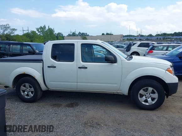 ✅ 2013 Nissan Frontier SV • VIN: 1N6AD0EV9DN720903 • Lot: 42735174. Listed on IAAI with 288,977 mi. Free auction sales archive from the USA and detailed vehicle history report at DreamBid. Image 13.