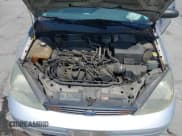 ✅ 2003 Ford Focus ZX3 • VIN: 3FAFP31Z03R173760 • Lot: 42458510. Listed on IAAI with 147,663 mi. Free auction sales archive from the USA and detailed vehicle history report at DreamBid. Image 10.