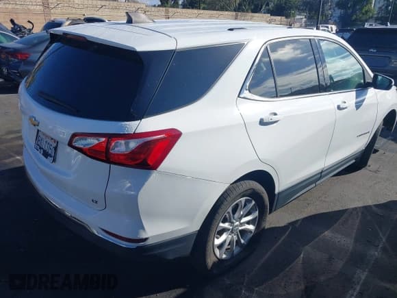 ✅ 2019 Chevrolet Equinox LT • VIN: 3GNAXKEVXKS651087 • Лот: 43447600. Опубликован ранее на IAAI с пробегом 58 873 миль. Бесплатный доступ к архиву аукционных продаж из США и подробный отчёт об истории автомобиля на DreamBid. Изображение 4.