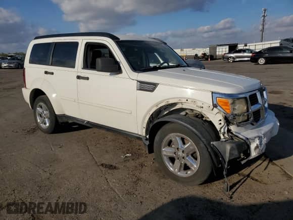 2007 Dodge Nitro SLT с VIN 1D8GU58KX7W681234, выставлен на аукционе Copart как лот 80648224 с пробегом 195 256 миль миль и На запчасти • Non repairable. История ставок и продаж доступна на DreamBid. Изображение 4.