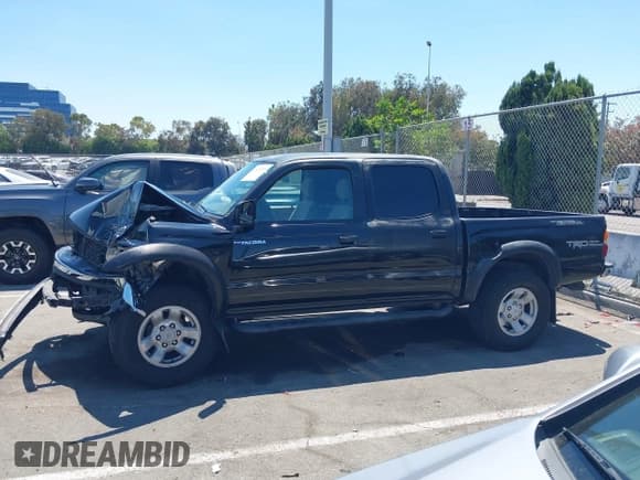 ✅ 2004 Toyota Tacoma PreRunner • VIN: 5TEGN92N94Z407298 • Lot: 42923295. Listed on IAAI with 128,249 mi. Free auction sales archive from the USA and detailed vehicle history report at DreamBid. Image 15.