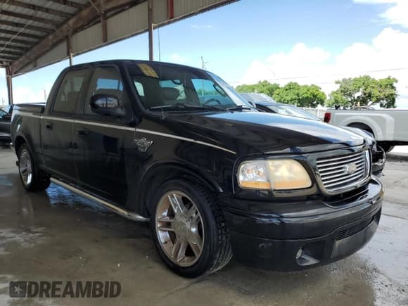 ✅ 2003 Ford F-150 Harley-Davidson • VIN: 1FTRW07383KD63595 • Lot: 59922725. Listed on Copart with 130,837 mi. Free auction sales archive from the USA and detailed vehicle history report at DreamBid. Image 4.
