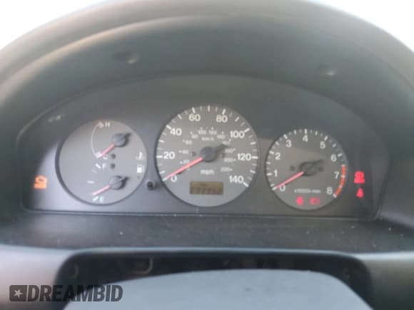 ✅ 1999 Mazda Protege DX • VIN: JM1BJ2222X0126273 • Lot: 75479364. Wystawiony na Copart z przebiegiem 293 952 mil. Bezpłatny archiwum sprzedaży aukcyjnych z USA i szczegółowy raport historii pojazdu na DreamBid. Zdjęcie 9.