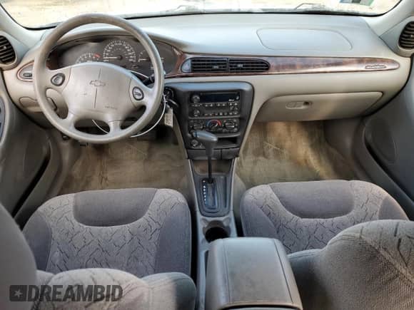 2002 Chevrolet Malibu LS z VIN 1G1NE52J62M592860, wystawiony jako Copart lot #82667534 z przebiegiem 91 706 mil mil oraz Szkoda całkowita • Salvage title. Historia ofert i sprzedaży dostępna na DreamBid. Obrazek 8.