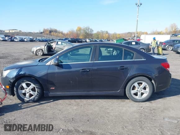 ✅ 2014 Chevrolet Cruze 1LT • VIN: 1G1PC5SB3E7363823 • Lot: 43610493. Listed on IAAI with 185,881 mi. Free auction sales archive from the USA and detailed vehicle history report at DreamBid. Image 6.