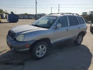✅ 2004 Hyundai Santa Fe GLS • VIN: KM8SC13D74U812202 • Lot: 54954965. Listed on Copart with 152,549 mi. Free auction sales archive from the USA and detailed vehicle history report at DreamBid. Image 1.