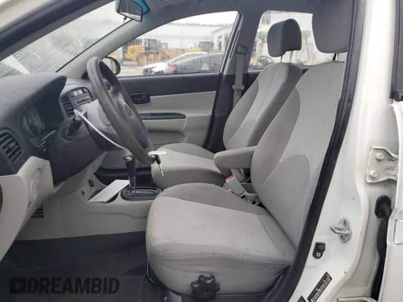 2009 Hyundai Accent Auto GLS z VIN KMHCN46C29U348942, wystawiony jako Copart lot #80129844 z przebiegiem 98 868 mil mil oraz Szkoda całkowita • Salvage title. Historia ofert i sprzedaży dostępna na DreamBid. Obrazek 7.