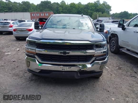 2018 Chevrolet Silverado 1500 LT z VIN 1GCRCREH9JZ111046, wystawiony jako IAAI lot #42837741 z przebiegiem 82 591 mil mil oraz . Historia ofert i sprzedaży dostępna na DreamBid. Obrazek 12.