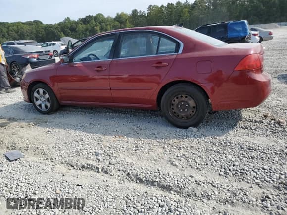 ✅ 2009 Kia Optima LX • VIN: KNAGE228X95289738 • Лот: 84746935. Опубликован ранее на Copart с пробегом 19 444 миль. Бесплатный доступ к архиву аукционных продаж из США и подробный отчёт об истории автомобиля на DreamBid. Изображение 2.