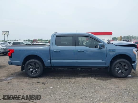 ✅ 2023 Ford F-150 Lightning Pro • VIN: 1FT6W1EVXPWG53591 • Лот: 42249385. Опубликован ранее на IAAI с пробегом 17 892 миль. Бесплатный доступ к архиву аукционных продаж из США и подробный отчёт об истории автомобиля на DreamBid. Изображение 13.