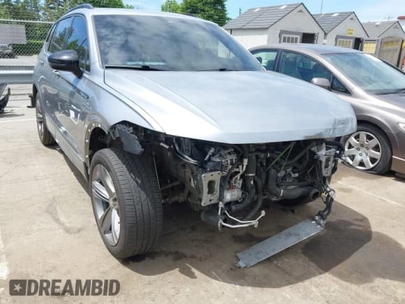 ✅ 2022 Volkswagen Tiguan SE R-Line Black • VIN: 3VV8B7AX9NM093043 • Лот: 42290191. Опубликован ранее на IAAI с пробегом 55 136 миль. Бесплатный доступ к архиву аукционных продаж из США и подробный отчёт об истории автомобиля на DreamBid. Изображение 1.