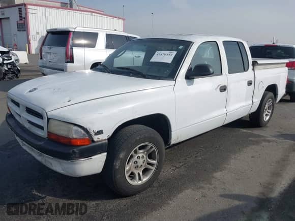 ✅ 2000 Dodge Dakota Sport • VIN: 1B7GL2AN8YS654014 • Лот: 41470554. Размещён на IAAI с пробегом 181 931 миль миль. Получите бесплатный доступ к архиву аукционных продаж из США и посмотрите подробный отчёт об истории автомобиля на DreamBid. Изображение 2.