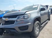 ✅ 2018 Chevrolet Colorado 2WD Work Truck • VIN: 1GCGSBEAXJ1294282 • Lot: 42041416. Listed on IAAI with 57,191 mi. Free auction sales archive from the USA and detailed vehicle history report at DreamBid. Image 2.