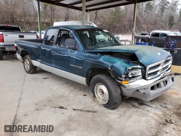 1998 Dodge Dakota SLT z VIN 1B7GL22Y9WS688713, wystawiony jako Copart lot #44952955 z przebiegiem 106 102 mil mil oraz Szkoda całkowita • Salvage title. Historia ofert i sprzedaży dostępna na DreamBid. Obrazek 4.