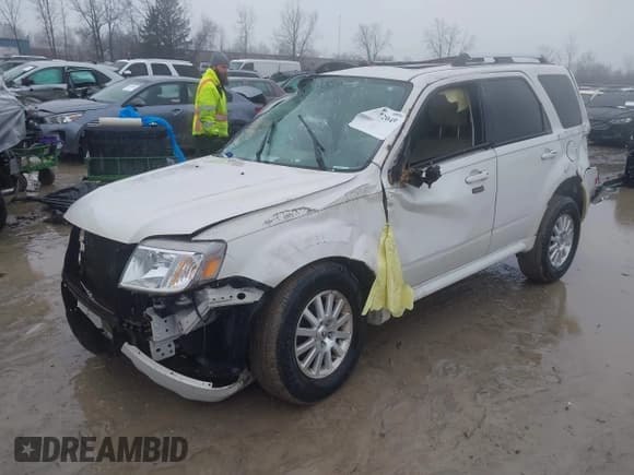 ✅ 2010 Mercury Mariner Premier • VIN: 4M2CN9HG8AKJ09679 • Lot: 41472049. Listed on IAAI with 99,554 mi. Free auction sales archive from the USA and detailed vehicle history report at DreamBid. Image 2.