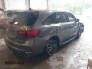 ✅ 2019 Acura MDX Technology • VIN: 5J8YD4H0XKL025557 • Lot: 42365567. Wystawiony na IAAI z przebiegiem 102 733 mil. Bezpłatny archiwum sprzedaży aukcyjnych z USA i szczegółowy raport historii pojazdu na DreamBid. Zdjęcie 4.