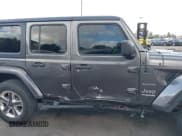 ✅ 2021 Jeep Wrangler Unlimited Sahara • VIN: 1C4HJXEN4MW503014 • Lot: 41900234. Listed on IAAI with 16,444 mi. Free auction sales archive from the USA and detailed vehicle history report at DreamBid. Image 13.