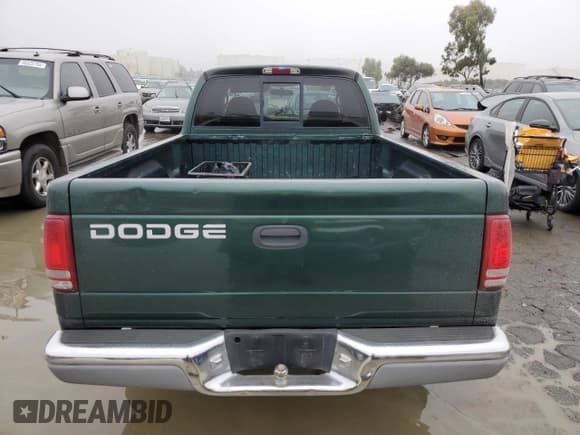 ✅ 2002 Dodge Dakota SLT • VIN: 1B7GL42X52S528521 • Lot: 85598784. Wystawiony na Copart z przebiegiem 168 740 mil. Bezpłatny archiwum sprzedaży aukcyjnych z USA i szczegółowy raport historii pojazdu na DreamBid. Zdjęcie 6.