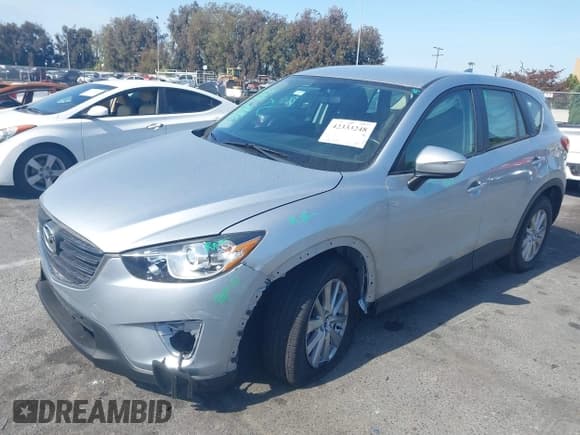 ✅ 2016 Mazda CX-5 Sport • VIN: JM3KE2BY4G0845816 • Lot: 42333248. Listed on IAAI with 48,504 mi. Free auction sales archive from the USA and detailed vehicle history report at DreamBid. Image 2.