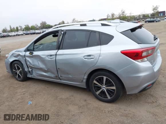 2020 Subaru Impreza Premium z VIN 4S3GTAV67L3731021, wystawiony jako IAAI lot #43383110 z przebiegiem 66 930 mil mil oraz . Historia ofert i sprzedaży dostępna na DreamBid. Obrazek 14.