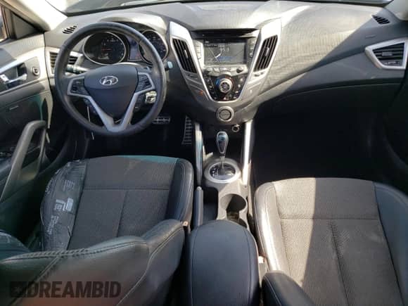 2013 Hyundai Veloster w/Gray Int с VIN KMHTC6AD4DU146811, выставлен на аукционе Copart как лот 64999524 с пробегом 71 496 миль миль и Списание • Salvage title. История ставок и продаж доступна на DreamBid. Изображение 8.