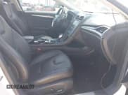 ✅ 2013 Ford Fusion Titanium • VIN: 3FA6P0SU0DR239890 • Lot: 42745530. Wystawiony na IAAI z przebiegiem 129 458 mil. Bezpłatny archiwum sprzedaży aukcyjnych z USA i szczegółowy raport historii pojazdu na DreamBid. Zdjęcie 5.