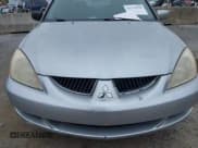 ✅ 2004 Mitsubishi Lancer LS • VIN: JA3AJ36E44U020349 • Lot: 41714325. Listed on IAAI with Not provided. Free auction sales archive from the USA and detailed vehicle history report at DreamBid. Image 6.