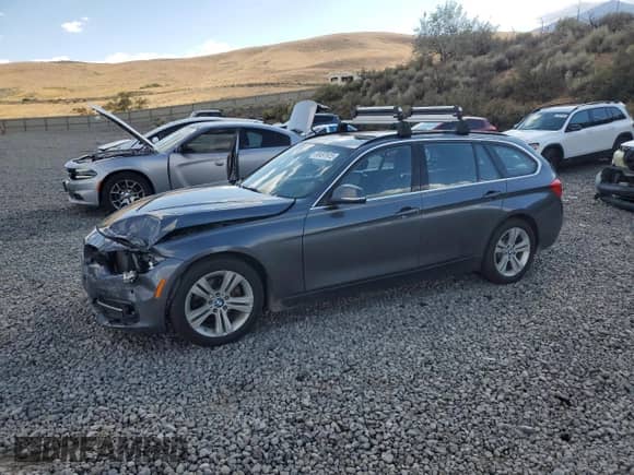 2018 BMW 3 Series 328d xDrive with VIN WBA8J1C55JA379468, listed as a Copart auction lot 80497915 with 84,486 mi miles and Salvage title. Bid and sale history available at DreamBid. Image 1.