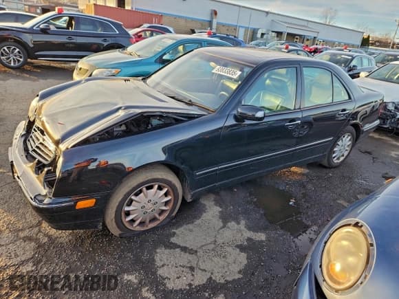 ✅ 2001 Mercedes-Benz E 320/430 4 Matic • VIN: WDBJF82J21X045584 • Lot: 93833835. Listed on Copart with 187,141 mi. Free auction sales archive from the USA and detailed vehicle history report at DreamBid. Image 1.