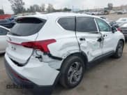 ✅ 2023 Hyundai Santa Fe SE • VIN: 5NMS14AJ5PH562703 • Lot: 43627051. Listed on IAAI with 38,143 mi. Free auction sales archive from the USA and detailed vehicle history report at DreamBid. Image 4.