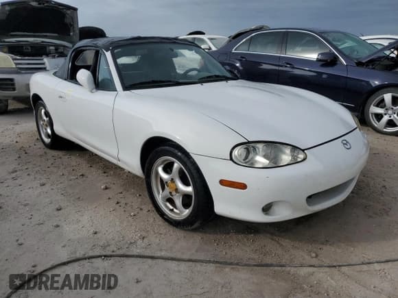 ✅ 2002 Mazda MX-5 Miata Cloth • VIN: JM1NB353X20222049 • Лот: 75404914. Опубликован ранее на Copart с пробегом Не указан. Бесплатный доступ к архиву аукционных продаж из США и подробный отчёт об истории автомобиля на DreamBid. Изображение 4.