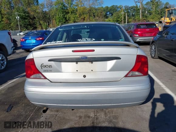 ✅ 2003 Ford Focus LX • VIN: 1FAFP33P43W334166 • Lot: 43258133. Listed on IAAI with Not provided. Free auction sales archive from the USA and detailed vehicle history report at DreamBid. Image 17.