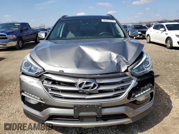 ✅ 2017 Hyundai Santa Fe Ultimate • VIN: 5XYZWDLA7HG482134 • Lot: 46307533. Wystawiony na Copart z przebiegiem 67 116 mil mil. Skorzystaj z bezpłatnego archiwum sprzedaży aukcyjnych z USA i zobacz szczegółowy raport historii pojazdu na DreamBid. Zdjęcie 5.