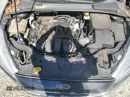 ✅ 2017 Ford Focus S • VIN: 1FADP3E23HL221097 • Лот: 82450025. Опубликован ранее на Copart с пробегом 98 700 миль. Бесплатный доступ к архиву аукционных продаж из США и подробный отчёт об истории автомобиля на DreamBid. Изображение 11.