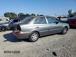 2004 Hyundai Accent GL с VIN KMHCG45C54U502872, выставлен на аукционе Copart как лот 81716375 с пробегом 73 421 миль миль и Списание • Salvage title. История ставок и продаж доступна на DreamBid. Изображение 3.