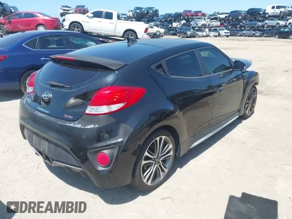 2016 Hyundai Veloster Turbo z VIN KMHTC6AE5GU281597, wystawiony jako IAAI lot #42006038 z przebiegiem 77 642 mil mil oraz . Historia ofert i sprzedaży dostępna na DreamBid. Obrazek 4.