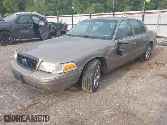 ✅ 2006 Ford Police Interceptor • VIN: 2FAHP71W26X144191 • Lot: 43142177. Listed on IAAI with Not provided. Free auction sales archive from the USA and detailed vehicle history report at DreamBid. Image 2.