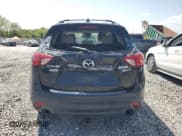 ✅ 2015 Mazda CX-5 Grand Touring • VIN: JM3KE2DY6F0448166 • Lot: 70999765. Wystawiony na Copart z przebiegiem 88 376 mil. Bezpłatny archiwum sprzedaży aukcyjnych z USA i szczegółowy raport historii pojazdu na DreamBid. Zdjęcie 6.