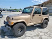 ✅ 2000 Jeep Wrangler Sahara • VIN: 1J4FA59S4YP757540 • Лот: 81065595. Опубликован ранее на Copart с пробегом 114 564 миль. Бесплатный доступ к архиву аукционных продаж из США и подробный отчёт об истории автомобиля на DreamBid. Изображение 1.