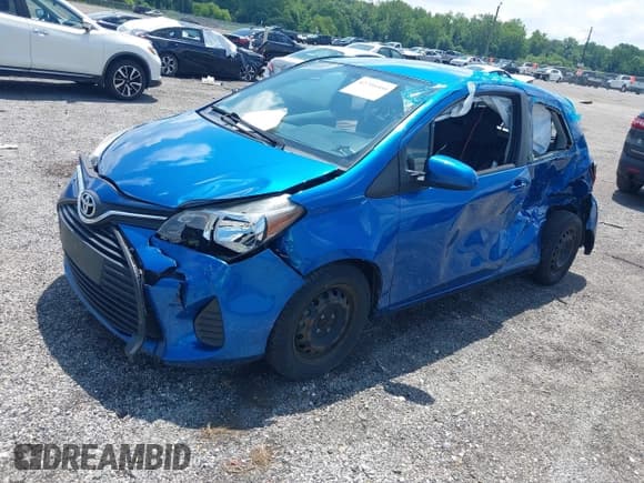 ✅ 2015 Toyota Yaris L • VIN: VNKJTUD38FA018344 • Лот: 42706466. Опубликован ранее на IAAI с пробегом 57 361 миль. Бесплатный доступ к архиву аукционных продаж из США и подробный отчёт об истории автомобиля на DreamBid. Изображение 2.