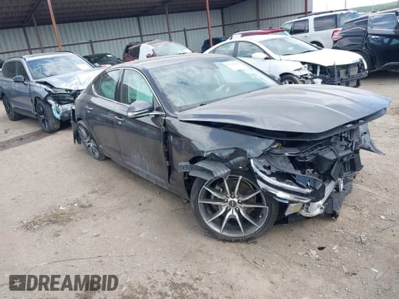 ✅ 2023 Genesis G70 2.0T • VIN: KMTG34TA7PU131190 • Лот: 42320448. Опубликован ранее на IAAI с пробегом 32 874 миль. Бесплатный доступ к архиву аукционных продаж из США и подробный отчёт об истории автомобиля на DreamBid. Изображение 1.