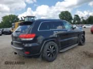 ✅ 2014 Jeep Grand Cherokee Overland • VIN: 1C4RJFCG0EC255463 • Lot: 67548855. Listed on Copart with 202,647 mi. Free auction sales archive from the USA and detailed vehicle history report at DreamBid. Image 3.