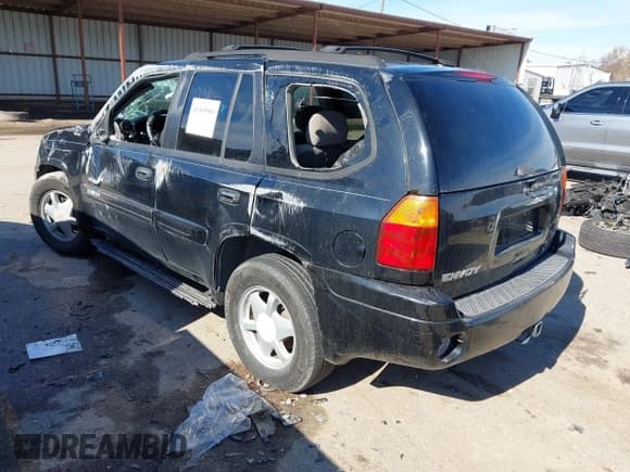 ✅ 2003 GMC Envoy SLE • VIN: 1GKDS13S732134354 • Lot: 41305506. Listed on IAAI with 221,733 mi. Free auction sales archive from the USA and detailed vehicle history report at DreamBid. Image 3.