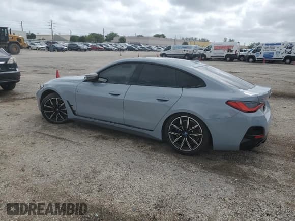 ✅ 2022 BMW i4 M50 • VIN: WBY33AW06NFM50076 • Lot: 79671634. Wystawiony na Copart z przebiegiem 16 858 mil. Bezpłatny archiwum sprzedaży aukcyjnych z USA i szczegółowy raport historii pojazdu na DreamBid. Zdjęcie 2.