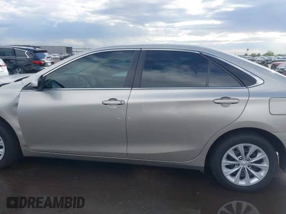 2016 Toyota Camry LE with VIN 4T4BF1FK1GR560412, listed as a IAAI auction lot 43517428 with 26,850 mi miles and . Bid and sale history available at DreamBid. Image 14.