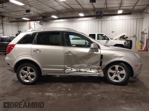 ✅ 2014 Chevrolet Captiva Sport LT • VIN: 3GNAL3EK5ES608871 • Lot: 42516982. Wystawiony na IAAI z przebiegiem 107 519 mil. Bezpłatny archiwum sprzedaży aukcyjnych z USA i szczegółowy raport historii pojazdu na DreamBid. Zdjęcie 14.