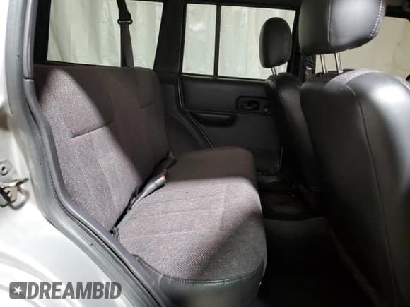 ✅ 2001 Jeep Cherokee Sport • VIN: 1J4FF58S11L549406 • Lot: 91100755. Listed on Copart with 145,496 mi. Free auction sales archive from the USA and detailed vehicle history report at DreamBid. Image 11.