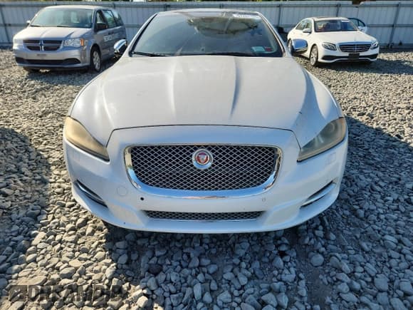 ✅ 2014 Jaguar XJ Portfolio • VIN: SAJWJ2GD9E8V67295 • Lot: 67207105. Listed on Copart with 121,936 mi. Free auction sales archive from the USA and detailed vehicle history report at DreamBid. Image 5.