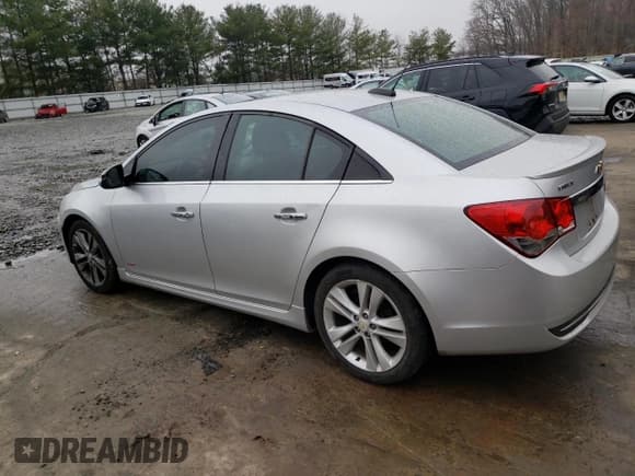 ✅ 2015 Chevrolet Cruze LTZ • VIN: 1G1PG5SB1F7228586 • Лот: 42331813. Опубликован ранее на Copart с пробегом 142 597 миль. Бесплатный доступ к архиву аукционных продаж из США и подробный отчёт об истории автомобиля на DreamBid. Изображение 2.